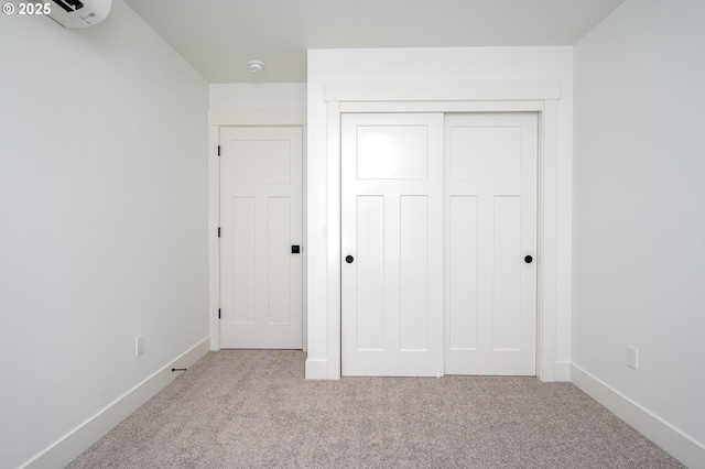 5827 NE 16th Ave, Portland, OR 97211 - unfurnished bedroom with carpet flooring, a closet, and baseboards