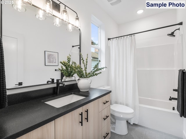 full bathroom featuring toilet, shower / tub combo with curtain, tile patterned flooring, and vanity