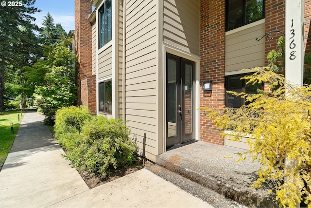 1368 Boca Ratan Dr, Lake Oswego, OR 97034 - view of exterior entry with brick siding