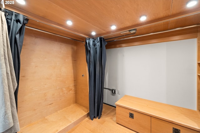 spacious closet with light wood-type flooring