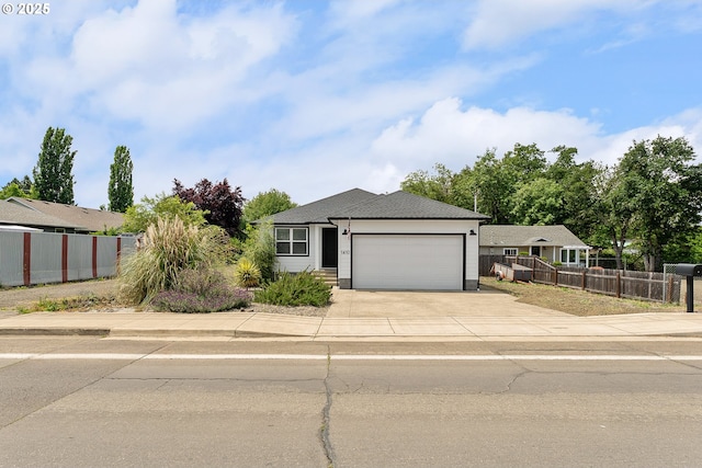 1410 NW Keasey St, Roseburg, OR 97471 - ranch-style house with an attached garage and driveway