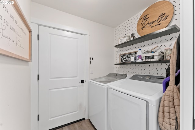1410 NW Keasey St, Roseburg, OR 97471 - washroom featuring separate washer and dryer and light wood-style flooring