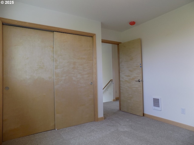 545 SE Firefly Ave, Corvallis, OR 97333 - unfurnished bedroom featuring light colored carpet and a closet