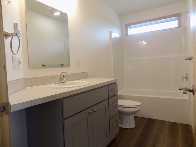 545 SE Firefly Ave, Corvallis, OR 97333 - bathroom featuring wood finished floors, vanity, toilet, and shower / bath combination