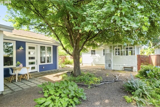 7228 N Villard Ave, Portland, OR 97217 - view of yard with a sunroom and a patio