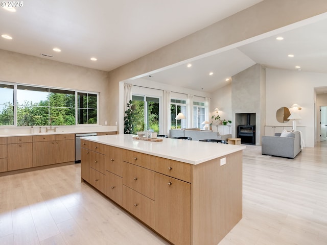 215 Cowlitz Vista Rd, Toledo, WA 98591 - kitchen with dishwasher, a center island, light countertops, light wood finished floors, and recessed lighting