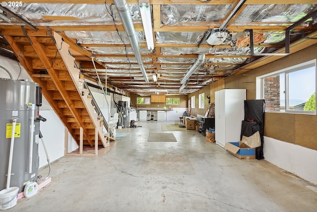below grade area with stairway and hybrid water heater