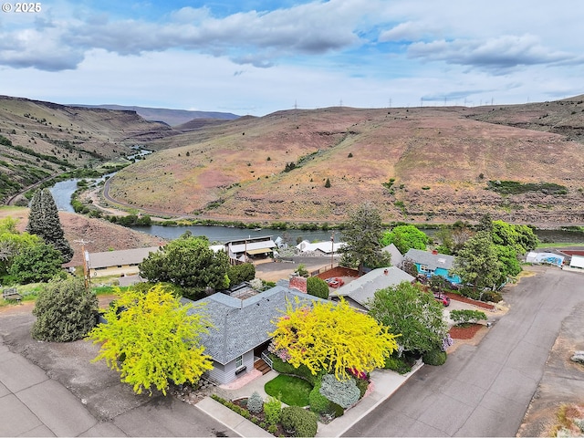 bird's eye view featuring a water and mountain view