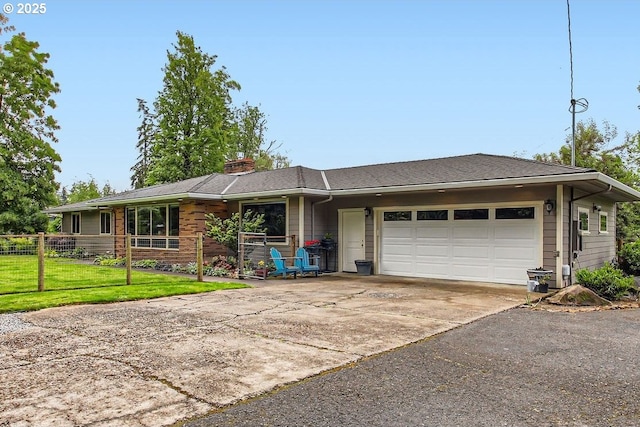 10588 Crosby Rd NE, Woodburn, OR 97071 - ranch-style home with asphalt driveway, a garage, and a chimney