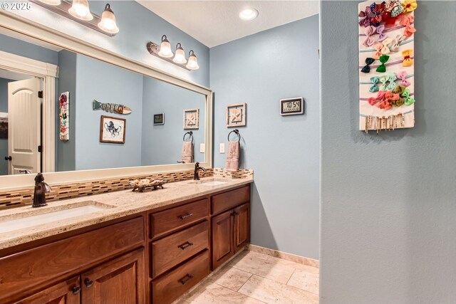 10588 Crosby Rd NE, Woodburn, OR 97071 - bathroom featuring double vanity and baseboards