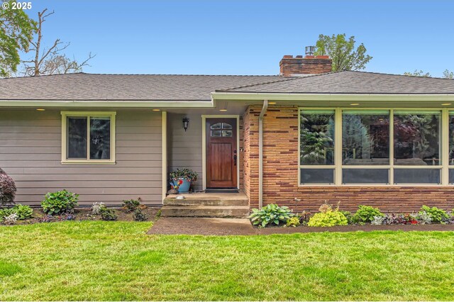 10588 Crosby Rd NE, Woodburn, OR 97071 - single story home with a chimney, a front yard, and roof with shingles