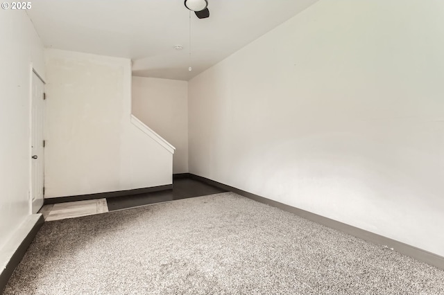 empty room featuring baseboards