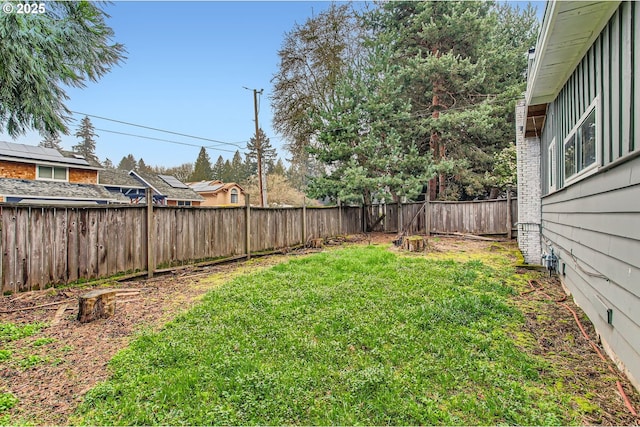 view of yard featuring a fenced backyard