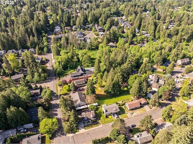 aerial view of property's location featuring nearby suburban area