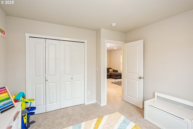 235 N 28th Pl, Ridgefield, WA 98642 - recreation room featuring light colored carpet and baseboards