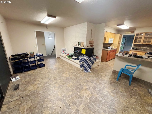 17373 SE Forest Hill Dr, Damascus, OR 97089 - misc room featuring stairway and light stone finish flooring