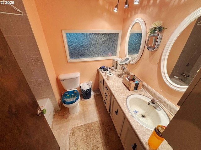 17373 SE Forest Hill Dr, Damascus, OR 97089 - bathroom featuring toilet, vanity, and tile patterned floors