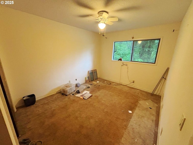 17373 SE Forest Hill Dr, Damascus, OR 97089 - empty room with carpet, ceiling fan, baseboards, and a textured ceiling