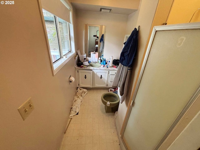 17373 SE Forest Hill Dr, Damascus, OR 97089 - full bathroom featuring tile patterned floors, vanity, an enclosed shower, and toilet