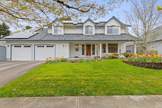 14100 SE 20th St, Vancouver, WA 98683 - view of front of house with covered porch, asphalt driveway, a front lawn, and solar panels
