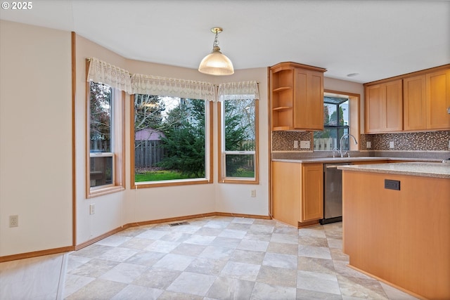 14100 SE 20th St, Vancouver, WA 98683 - kitchen with dishwasher, tasteful backsplash, open shelves, and light countertops