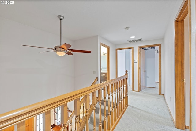 14100 SE 20th St, Vancouver, WA 98683 - hallway featuring an upstairs landing, light carpet, and baseboards