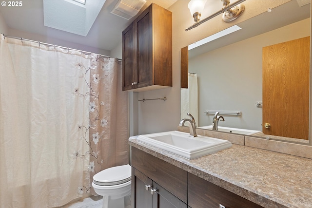 14100 SE 20th St, Vancouver, WA 98683 - full bathroom featuring vanity, toilet, a skylight, and a shower with shower curtain