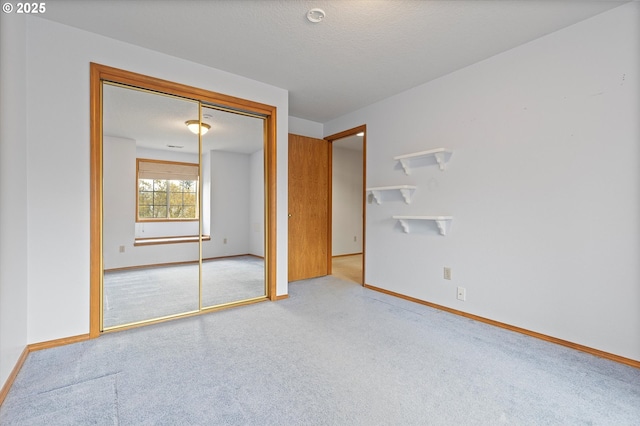 14100 SE 20th St, Vancouver, WA 98683 - unfurnished bedroom with carpet floors, baseboards, and a closet