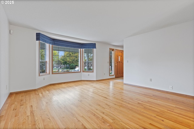 14100 SE 20th St, Vancouver, WA 98683 - unfurnished room with light wood-type flooring and baseboards