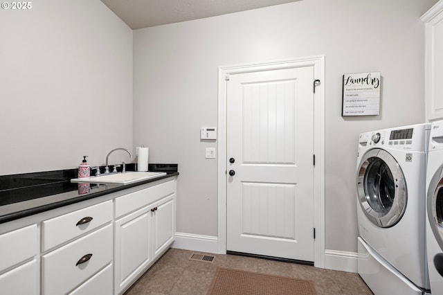 1622 Provincial Way, Eugene, OR 97401 - washroom featuring separate washer and dryer and cabinet space