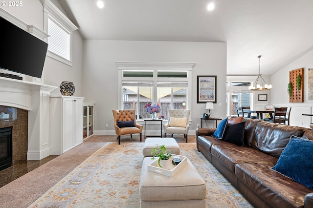 1622 Provincial Way, Eugene, OR 97401 - living area with a fireplace, granite tiled floors, recessed lighting, vaulted ceiling, and a chandelier