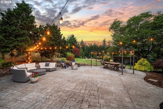 patio terrace at dusk with an outdoor living space and a gazebo