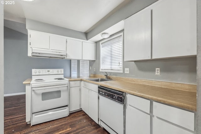 kitchen featuring white cabinetry, white appliances, dark hardwood / wood-style floors, and sink