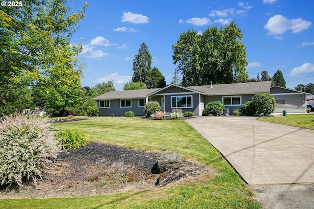 1552 59th Ave SE, Salem, OR 97317 - ranch-style home with a front yard and concrete driveway
