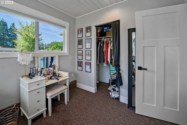 1552 59th Ave SE, Salem, OR 97317 - office area featuring dark carpet, baseboards, and wood ceiling