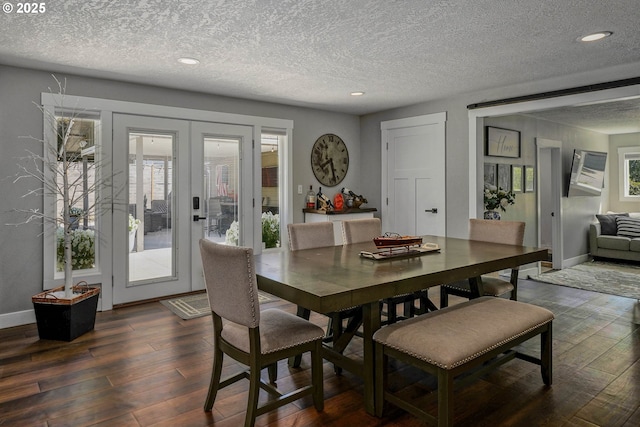 1552 59th Ave SE, Salem, OR 97317 - dining space featuring french doors, dark wood-style floors, a textured ceiling, recessed lighting, and baseboards