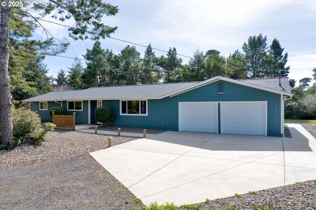 2034 45th St, Florence, OR 97439 - ranch-style home with driveway and an attached garage