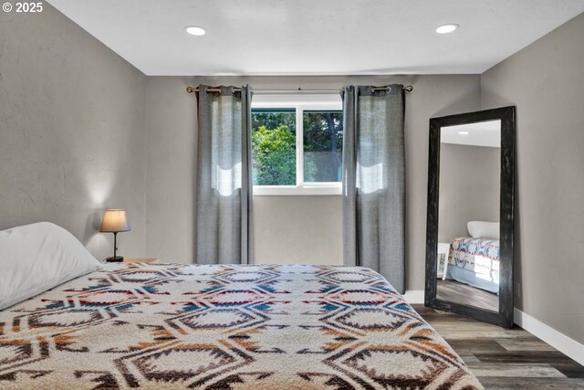 2034 45th St, Florence, OR 97439 - bedroom with recessed lighting, baseboards, and wood finished floors