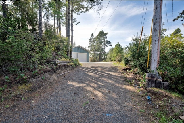 2034 45th St, Florence, OR 97439 - view of yard featuring an outbuilding and a detached garage