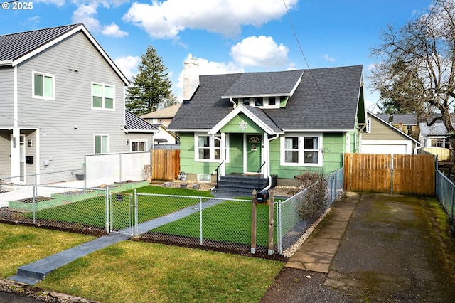 bungalow-style house with a front yard