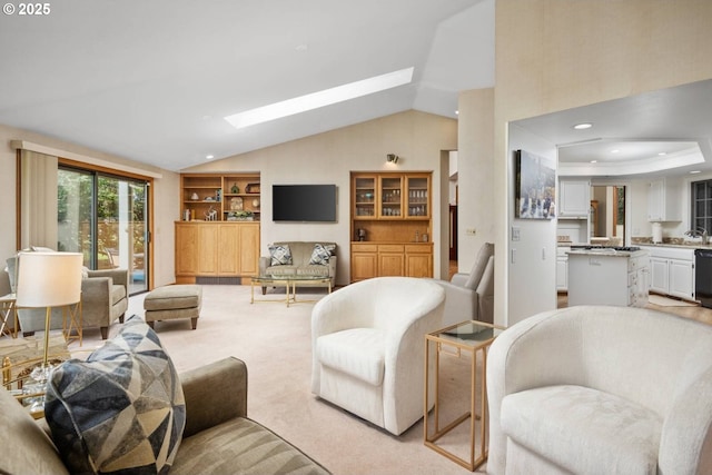863 Fairway View Dr, Eugene, OR 97401 - living area with light colored carpet, a skylight, recessed lighting, and high vaulted ceiling