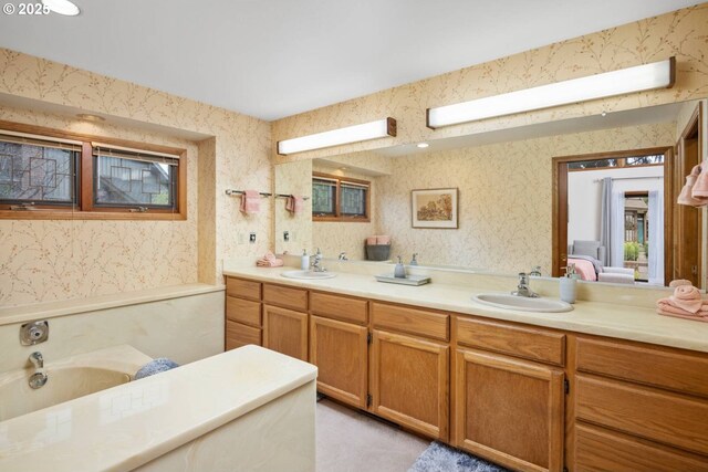 863 Fairway View Dr, Eugene, OR 97401 - full bathroom with wallpapered walls, double vanity, and a tub to relax in