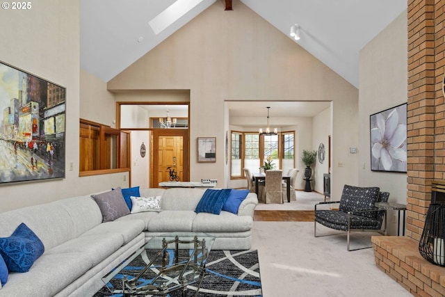 863 Fairway View Dr, Eugene, OR 97401 - living room featuring high vaulted ceiling, a chandelier, a skylight, a fireplace, and carpet floors