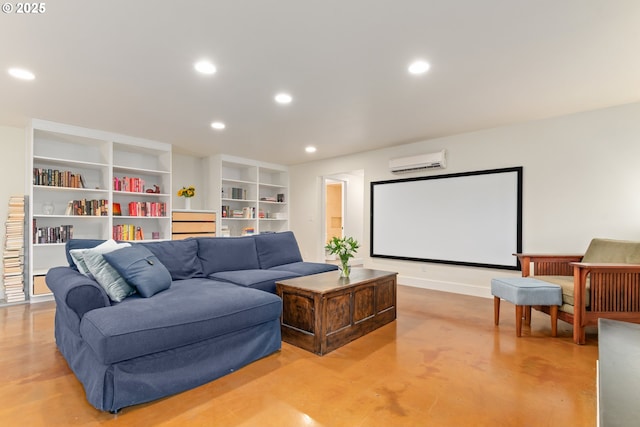 cinema room with recessed lighting, an AC wall unit, baseboards, and finished concrete flooring