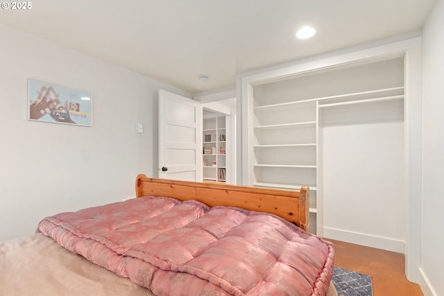 bedroom featuring recessed lighting and baseboards