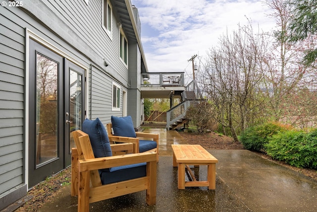 view of patio / terrace featuring stairs