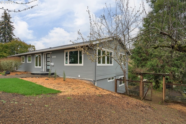 view of front of home with fence