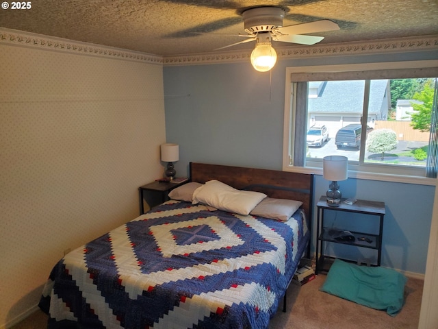 bedroom featuring carpet flooring, a ceiling fan, and baseboards