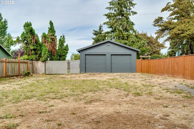 garage with a lawn