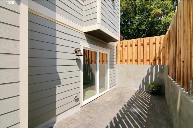 view of patio / terrace with fence